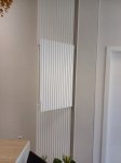 mueble-para-tapar-puerta-contador-con-paneles-decorativos2