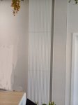 mueble-para-tapar-puerta-contador-con-paneles-decorativos4