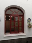 ventana-corredera-con-arco-rebajado-